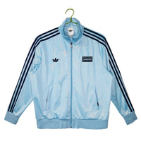 Cappotto Oasis x Adidas 2025