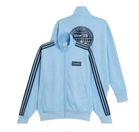 Cappotto Oasis x Adidas 2025
